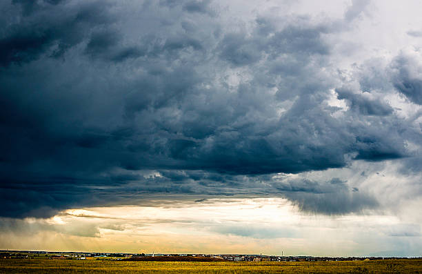 istock Intense thunderstorms with heavy clouds hover over Colorado neighborhood 587534670