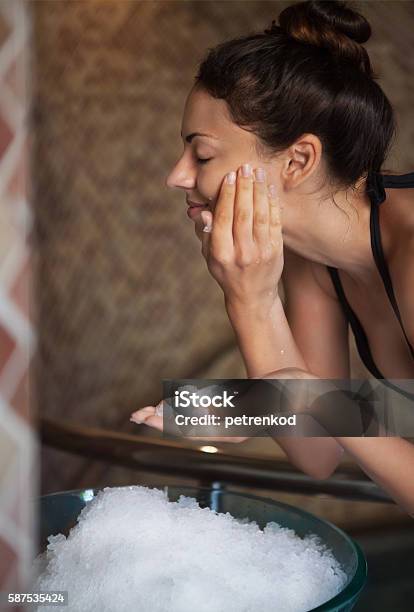 Beautiful Happy Woman With Natural Looking Makeup Holding Ice Ne Stock Photo - Download Image Now