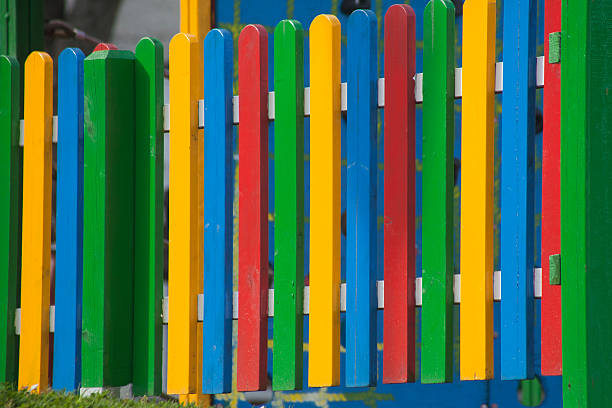 istock New multicolored wooden fence 587536740