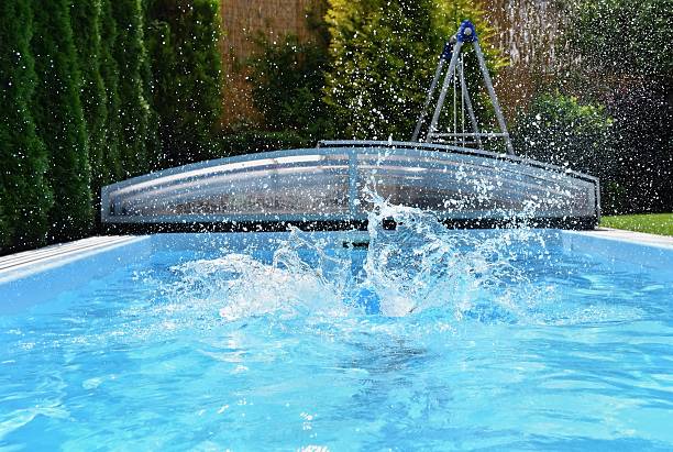 istock Splash in the pool  Summer background for traveling. 587538190