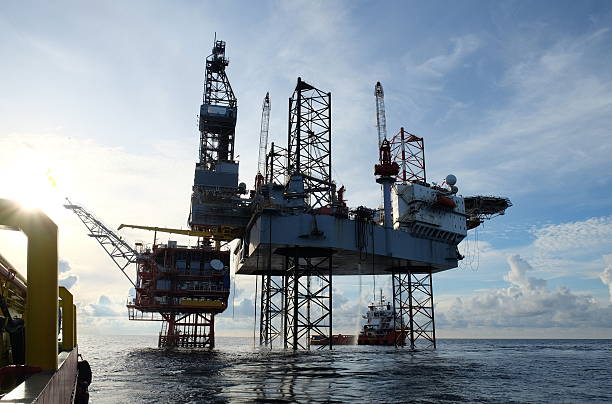 istock Offshore construction platform for production oil and gas 587541430