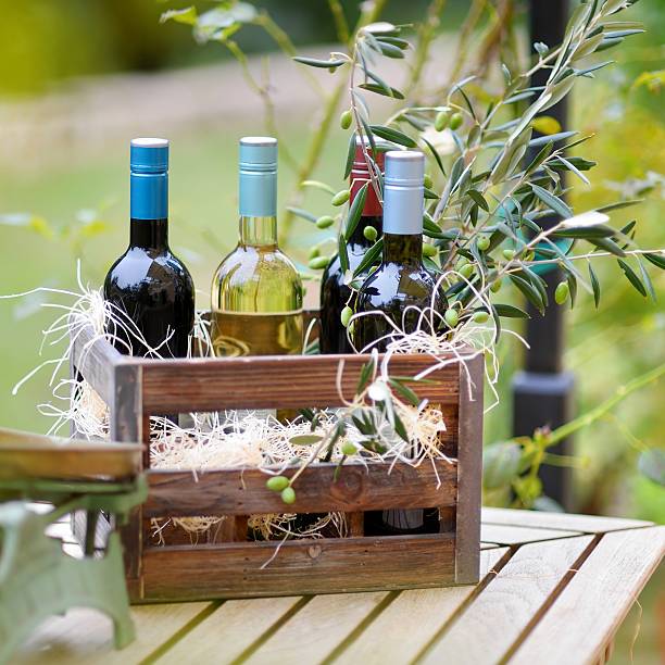 istock Wine bottles in a wooden crate 587542398