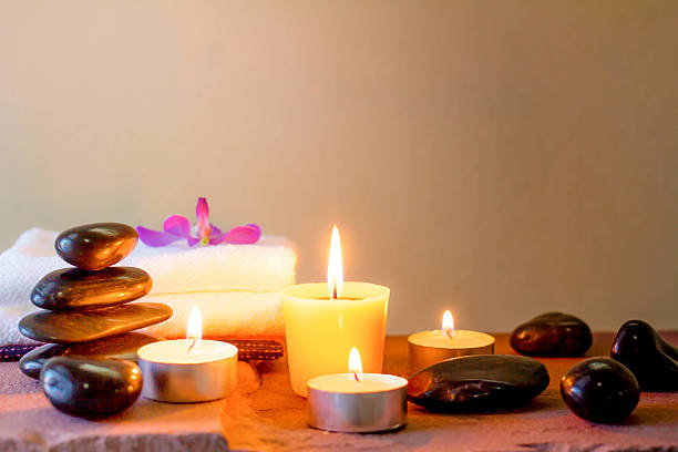 istock Zen stones and aromatic candles on table,Zen concept. 587543242
