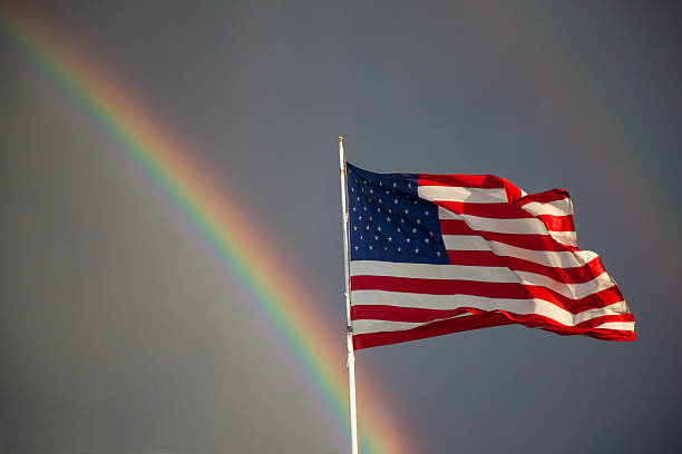 istock American Flag and Double Rainbow 587544484
