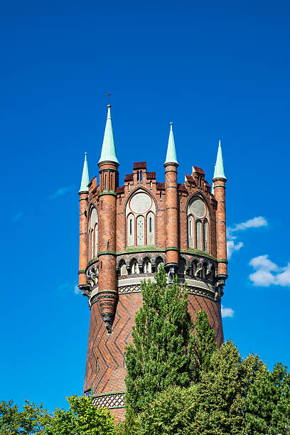 Water tower in Rostock (Germany) with blue sky.