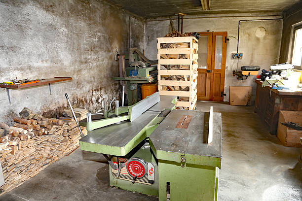 istock carpentry workshop with machinery to cut the wooden planks 587547206
