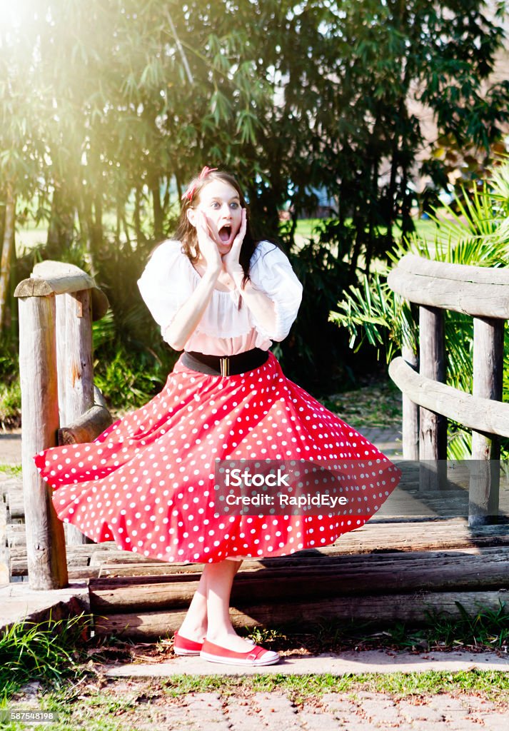 Pretty Girl By Rustic Bridge Gasps Whirling Round In Shock Stock Photo ...