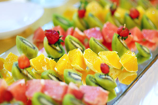 istock Plate full of sliced fresh fruits 587549328
