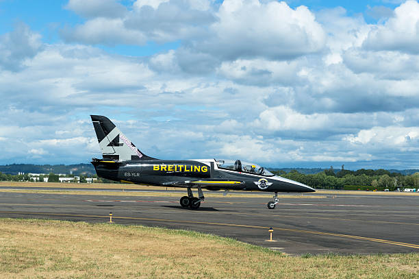 breitling jet team airplane runway air show hillsboro oregon clouds - stunt airplane air air vehicle imagens e fotografias de stock