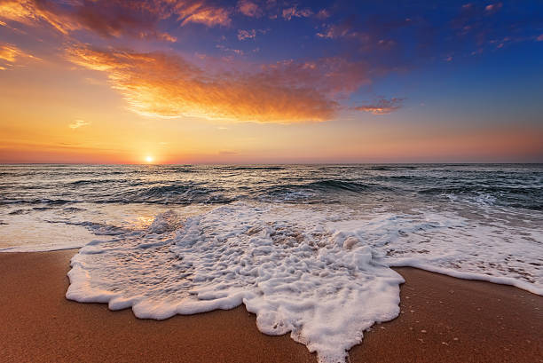 istock Beautiful tropical sunrise on the beach. 587551838