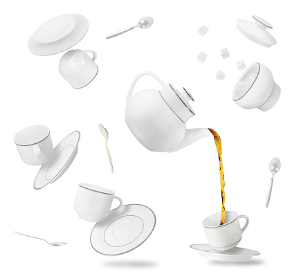 falling tea cups, saucers and pot