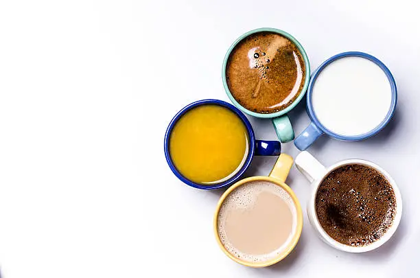 Photo of Five  cups on a white background