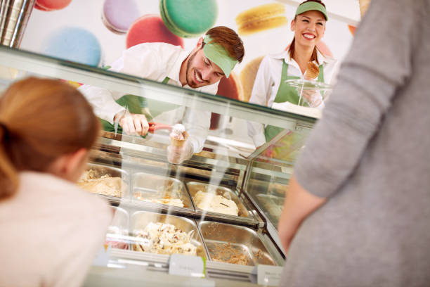 istock In pastry store sellers serves customers 587775144