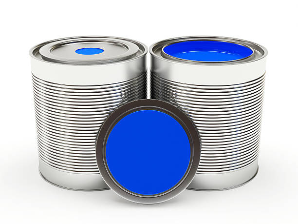 istock Cans of blue paint with space for text on white 587775362