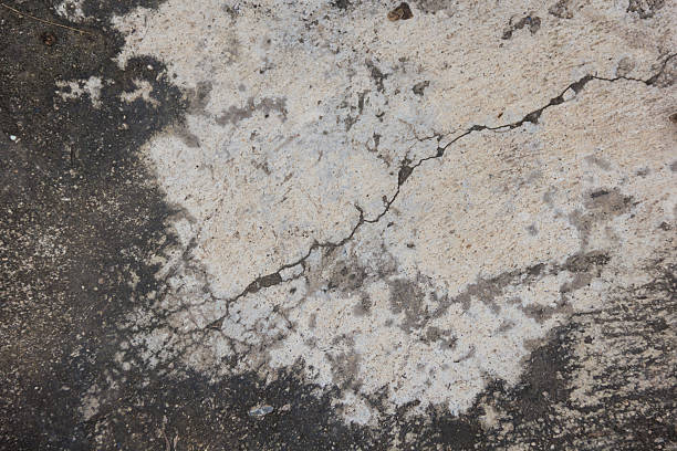 istock grunge crack moist concrete wall texture 587775692