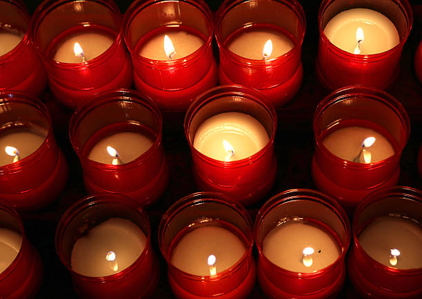 istock series of candles lit 587776030