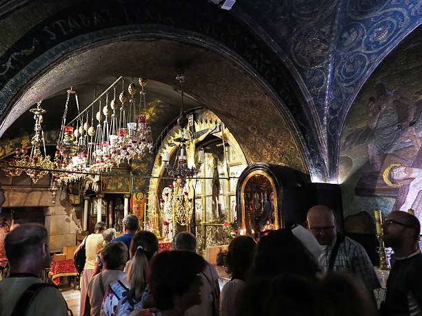 Stone Golgotha, in the Basilica of the Holy Sepulchre, Jerusalem Jerusalem, Israel - Juli 15, 2015: Stone Golgotha, the place of Jesus' death in the Basilica of the Holy Sepulchre, the holiest place of Christians, July 15, 2015 in Jerusalem, Israel tomb of the virgin mary in jerusalem stock pictures, royalty-free photos & images
