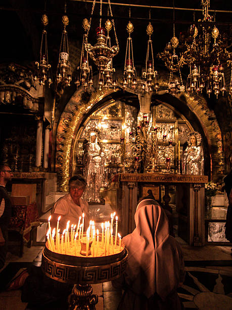 Stone Golgotha, in the Basilica of the Holy Sepulchre, Jerusalem Jerusalem, Israel - Juli 15, 2015: Stone Golgotha, the place of Jesus' death in the Basilica of the Holy Sepulchre, the holiest place of Christians, July 15, 2015 in Jerusalem, Israel tomb of the virgin mary in jerusalem stock pictures, royalty-free photos & images