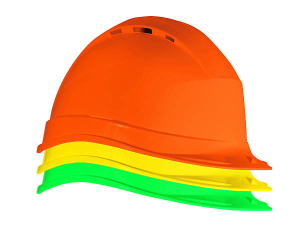 istock Yellow, red, and green safety helmets 587779092
