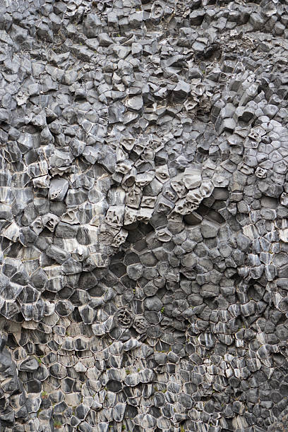 Volcanic rock wall stock photo