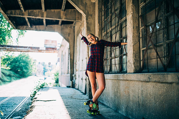 istock Beautiful girl on roller skates 587782908