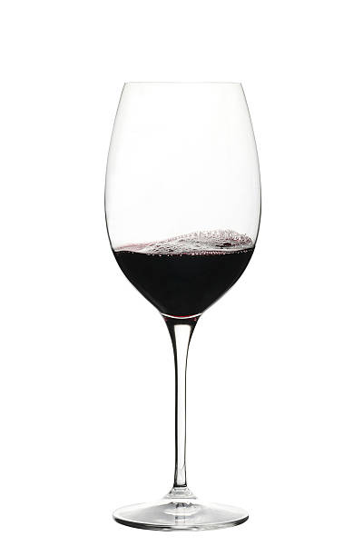 istock Red wine in a glass isolated 587782944