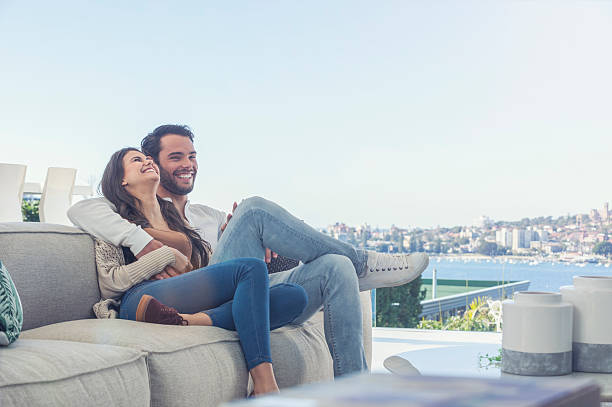 istock Couple relaxing on the sofa. 587782988