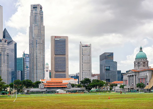 Singapore - October 10, 2023: The Parliament building, established in 1965, in Singapore with corporate office towers in the background.