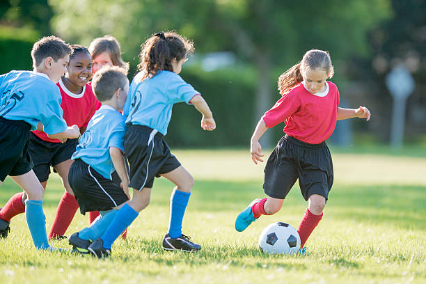 istock Kicking the Ball up the Field 587785256