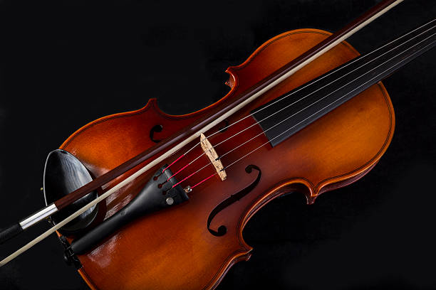 istock Close up High Angle View Of Violin And Bow 587785438