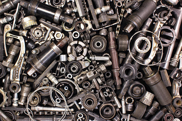 istock Pile of old bicycle parts and tools 587786356