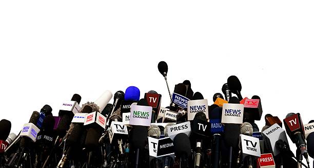 Microphones during press conference stock photo