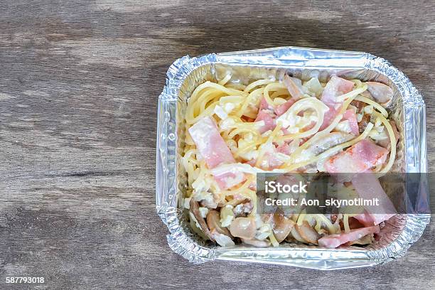 Spaghetti Carbonara In Floyd Box On Wood Background Stock Photo - Download Image Now