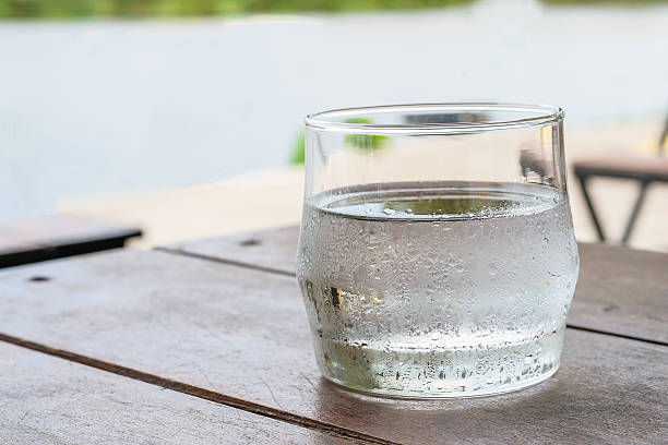 istock Glass of water on the table at restaurant 587793236
