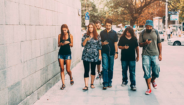 istock Texting on the street 587793362
