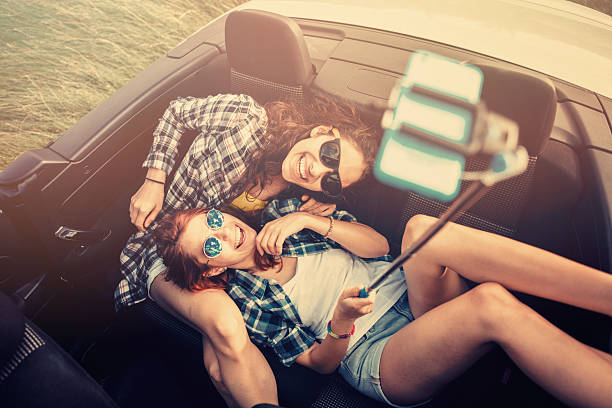 istock Friend Selfie With a Selfie Stick 587793432