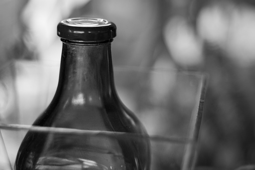 Beautiful black and white photo of a blurred bottle. 