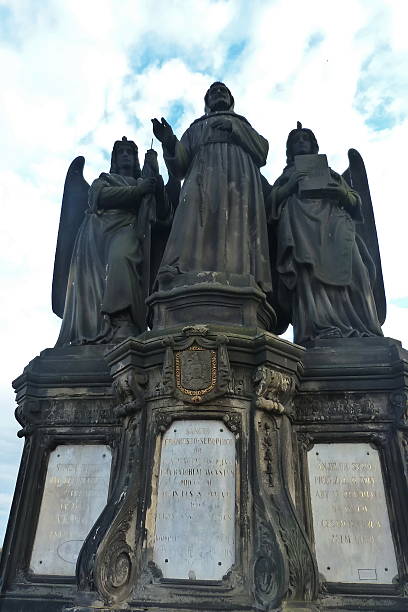 istock Group of statues on Charles Bridge in Prague 587798922