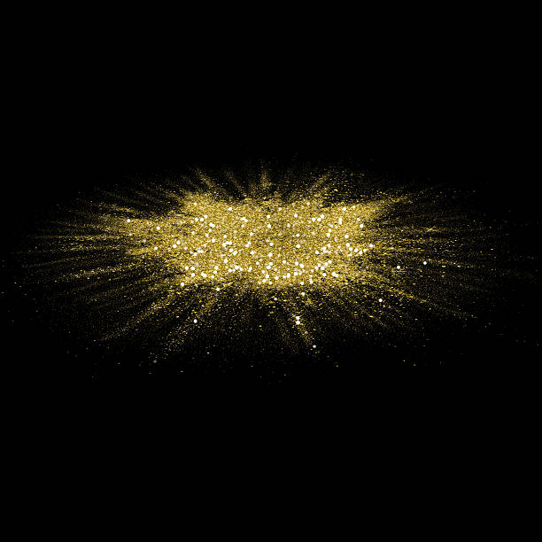istock Gold glitter powder scattered on black background. 587803156