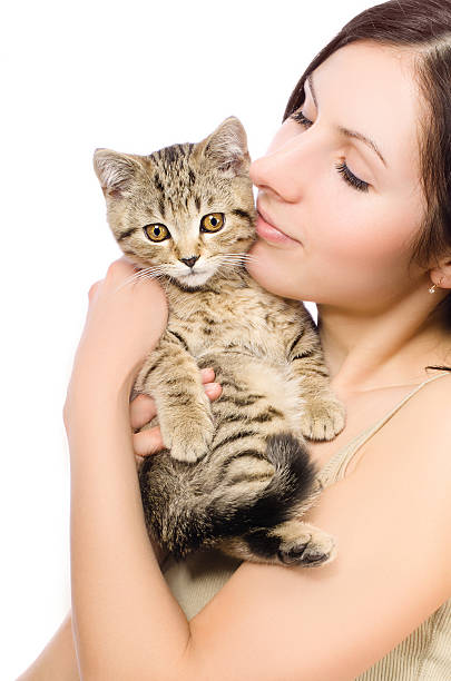 istock Beautiful  woman with a kitten 587805872