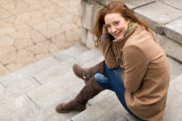 istock Young red hair woman 587807140