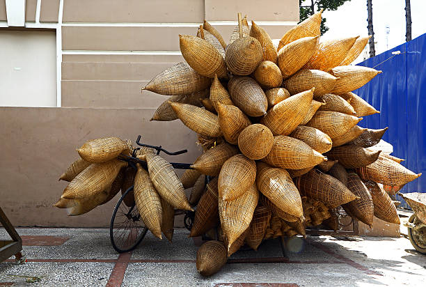 istock Bicycle overloaded with wicker fish traps in Vietnam 587807786