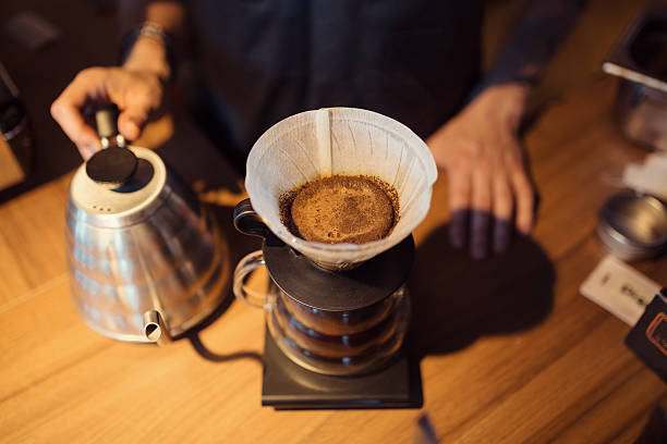 istock Barista at work in a coffee shop 587808038
