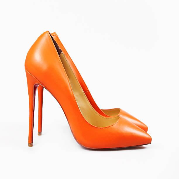 istock orange female shoes 587808540