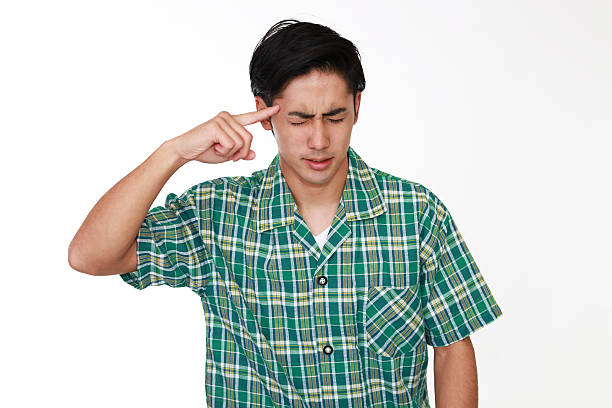 istock Tired and stressed Asian man 587809280