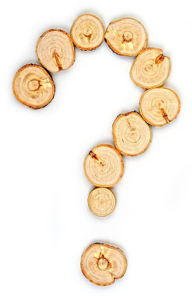 istock wooden question, punctuation icon on a white background 587810598