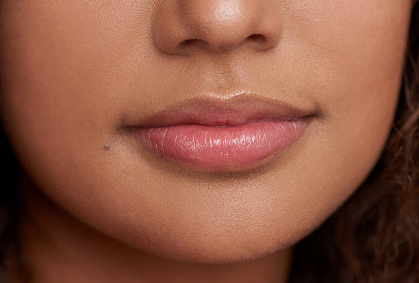 istock Beautiful lips speak louder than words 587811648