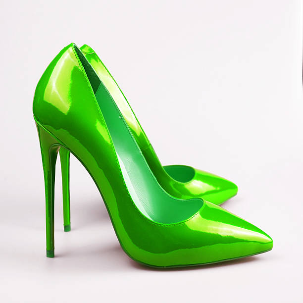 istock summer female green shoes on white 587812274