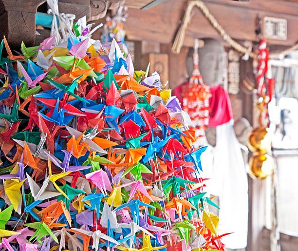 istock Thousand paper cranes made with origami 587812286