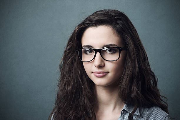 istock Young nerd woman with glasses 587813136